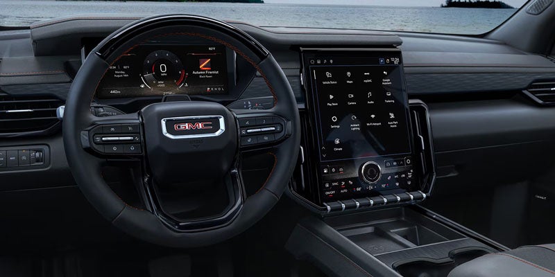 Infotainment system with display screen showing different options in 2026 GMC Acadia
