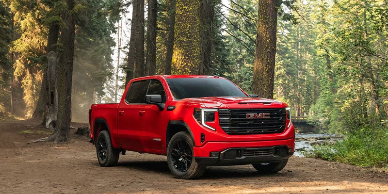 2026 GMC Sierra 1500 in red with scenic background
